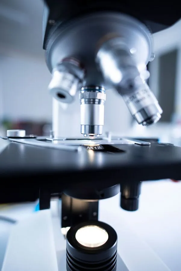 Modern laboratory microscope, close-up of objective lens